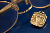 glasses and cufflinks - law